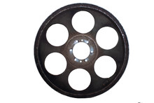An Old Ferrous Wheel Is Covered By A Blight..