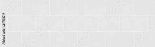 Photo Panorama of white tile wall pattern and seamless background