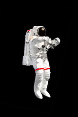 Poster - Astronaut in spacesuit close up isolated on black background. Spaceman in outer space. Elements of this image furnished by NASA