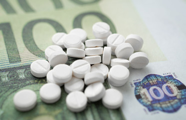 Wall Mural - the pills and euro banknotes, medical abstract