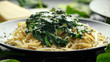 Tagliatelle pasta with spinach in cream sauce with parmesan