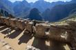 Girl playing with shadows at Archaeological site Machu Picchu Peru 