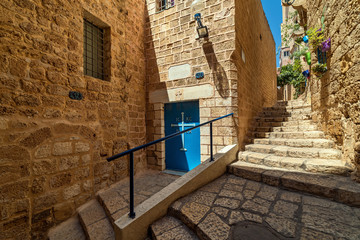 Narrow street and old walls in Jaffa, Israel.