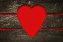 Heart Is Carved Into The Boards On A Red Background. Copy Space. Mothers Day. Valentine's Day Background.