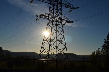 high voltage line in the fog nature beauty