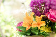 Beautiful bouquet of flowers in wicker basket