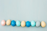 Fototapeta  - easter eggs on blue wooden background
