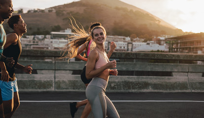 Wall Mural - Runners training outdoors in morning