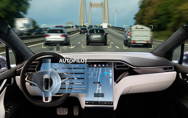 Wall Mural - Self driving car on a road. Autonomous vehicle. Inside view. 