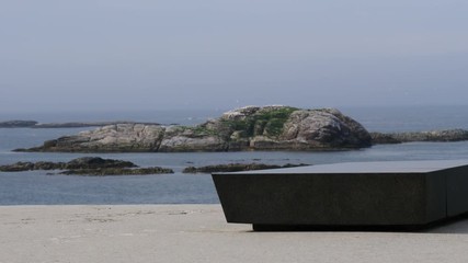 Poster - Kleivodden rest stop area viewpoint with stone seating bench. Arctic ocean view. Andoya island Vesteralen Norway