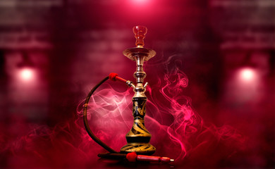 Canvas Print - Hookah smoke on the background of an empty brick wall and concrete floor. Spotlight, neon red light, smoke