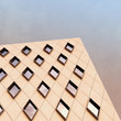 © Sergey - The facade of the building in modern style is lit by the morning sun. 3D illustration.