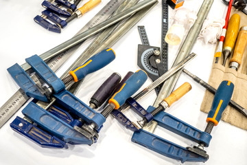 Clips for carpentry work. Tool joiner. On the table is a tool for carpentry work.