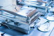 Chafing Dishes. Catering food. chafing dishes in line. Dishes for the restaurant. Heated Buffet Containers.