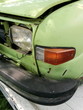 Scheinwerfer und Blinker eines restaurierungsbedürftigen Gebrauchtwagen aus Schweden der Siebzigerjahre ohne Kühlergrill in Lemgo bei Detmold in Ostwestfalen-Lippe