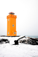 Orange Lighthouse In Winter