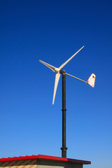 Wall Mural - Small wind turbines in the sky