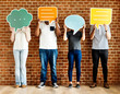 © Rawpixel.com - People holding speech bubble icons