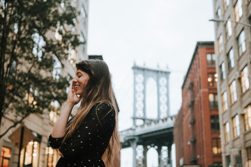 Shy woman in downtown Manhattan, USA