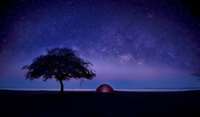 Wall Mural - milky way galaxy, on the mountains above the dam. long exposure photograph, with grain.image contain