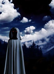 Wall Mural - Spooky monster in hooded cloak in misty landscape