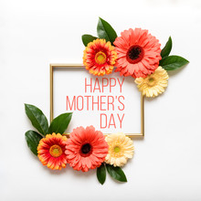 Happy Mother's Day Living Coral Pantone Color Background. Flat Lay Greeting Card With Beautiful Coral Hue Gerbera Flowers On White Background.