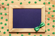 St Patricks Day Background With Green Quatrefoils On The Wooden Background