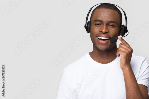 Smiling African American Man Wearing Wireless Headset Talking To Microphone Looking At Camera Isolated On White Background With Copy Space Black Call Center Operator Customer Service Agent Portrait Photo Stock Adobe Smiling African American Man Wearing Wireless Headset Talking To Microphone Looking At Camera Isolated On White Background With Copy Space Black Call Center Operator Customer Service Agent Portrait Photo Stock Adobe