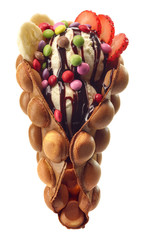 Wall Mural - Hong kong or bubble waffle with ice cream, fruits and candy