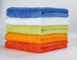 Multicolored towels on a white background