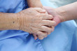 © amazing studio - Holding Touching hands Asian senior or elderly old lady woman patient with love, care, helping, encourage and empathy at nursing hospital ward : healthy strong medical concept
