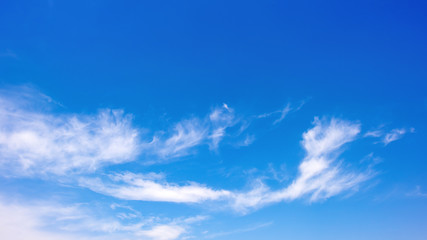 Wall Mural - Clouds on a blue sky as background
