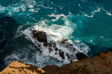 Waves crashing on rocks