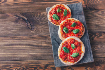 Wall Mural - Mini Margherita pizzas with red cheese