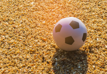 Soccer ball on the Golden Sands of the morning.