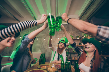 Poster - Low below angle view of nice attractive lovely stylish cheerful cheery optimistic positive group of people guys gathering union having fun clinking jar mug over served table congrats in house pub