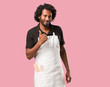 © Asier - Handsome african american baker cheerful and excited, smiling and raising her thumb up, concept of success and approval, ok gesture