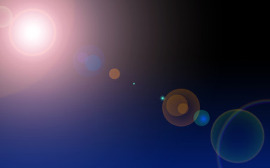 solar glow and lens flare on dark background