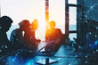 © alphaspirit - Silhouette of business people work together in office. Concept of teamwork and partnership. double exposure with network effects