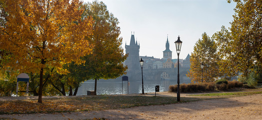 Wall Mural - Prague - The look from promenade to The Charles bride in autumn morning.