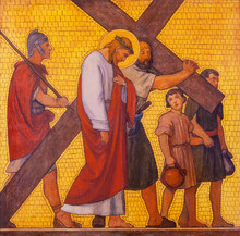 PRAGUE, CZECH REPUBLIC - OCTOBER 17, 2018: The Painting Simon Of Cyrene Helps Jesus Carry The Cross In The Church Kostel Svatého Cyrila Metodeje By  S. G. Rudl (1935).