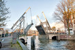 Drawbridge is opening in the centre of Amsterdam,  Netherlands.