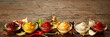 Rustic wood banner with a variety of sauces