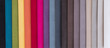 © serikbaib - Colorful upholstery fabric samples in store