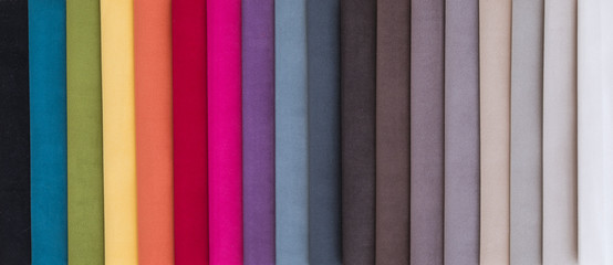 Canvas Print - Colorful upholstery fabric samples in store