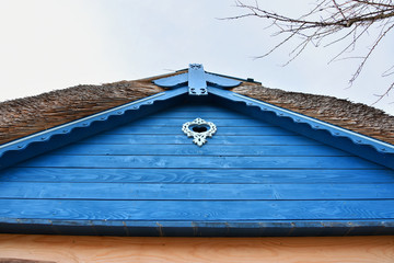 Poster - House outdoor decoration in Jurilovca village an important fishing center in Danube Delta area and tourists attraction in Tulcea, Romania