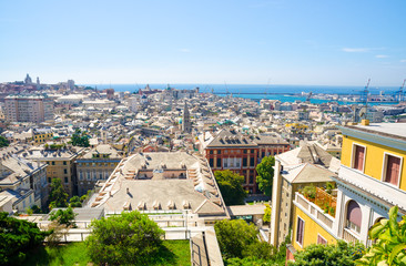 Top aerial scenic panoramic view from above of old historical centre quarter districts of european city Genoa (Genova), port and harbor of Ligurian and Mediterranean Sea, Liguria, Italy