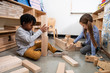 © Lucy Schaeffer - Boy and girl playing with wooden blocks