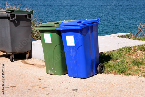 Trash Can Garbage Bin Recycling In Tourist Complex By Sea Trash Can Garbage Bin Recycling In Tourist Complex By Sea Side Of Road Waiting To