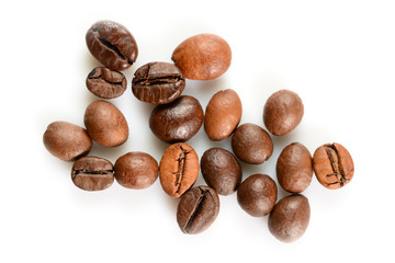 Wall Mural - Coffee beans. Some different roasted coffee beans, close up macro, isolated on white background.